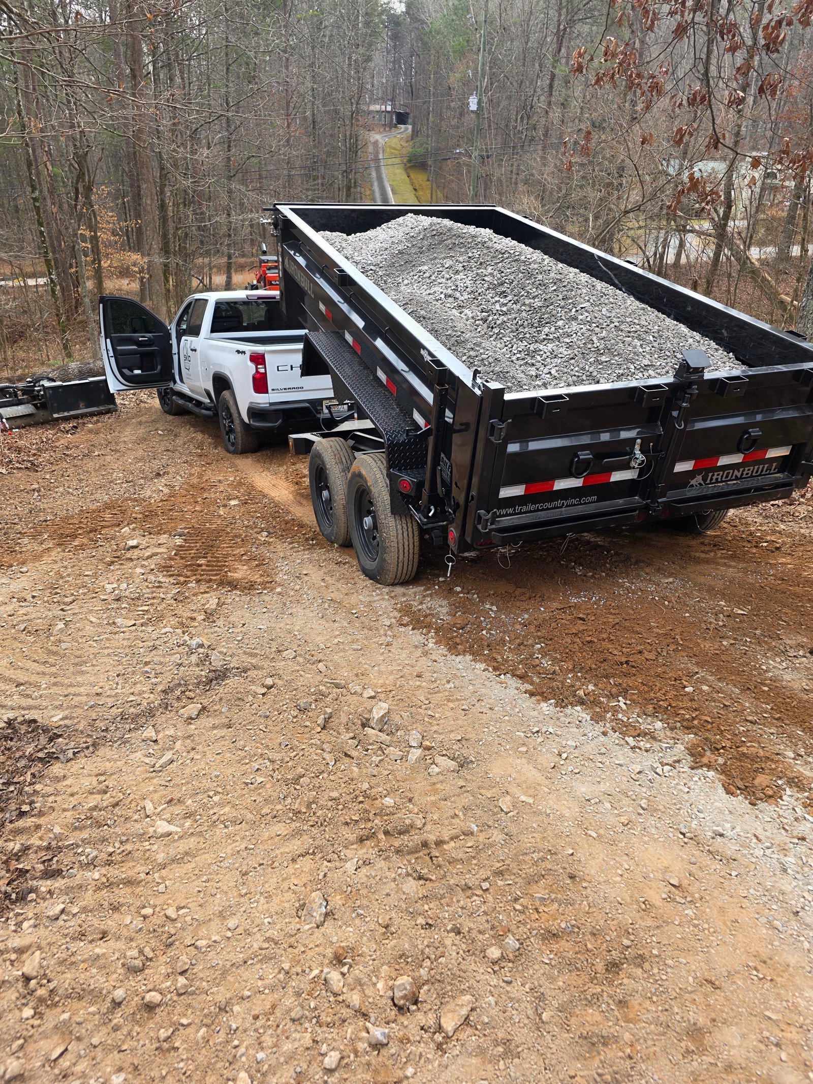 Delivered gravel used for driveway repair in North Georgia